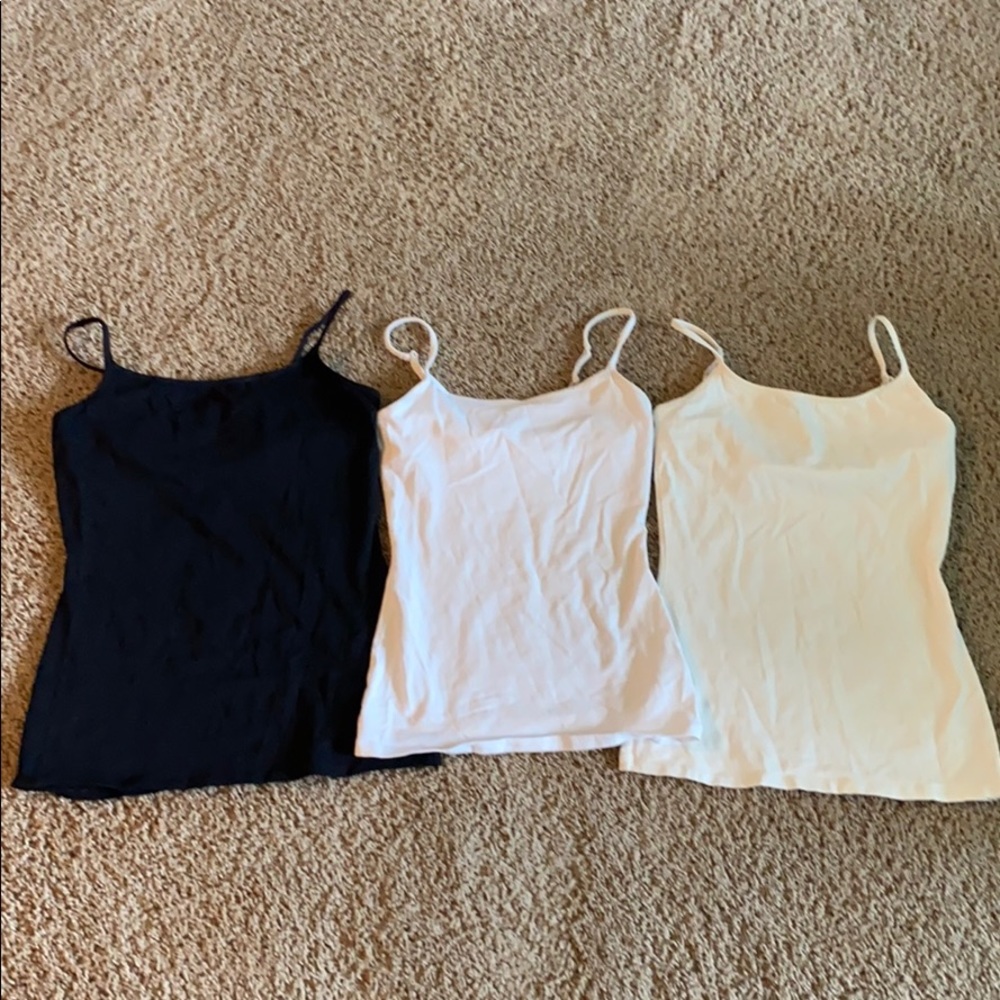 Three express tank tops with built in bras